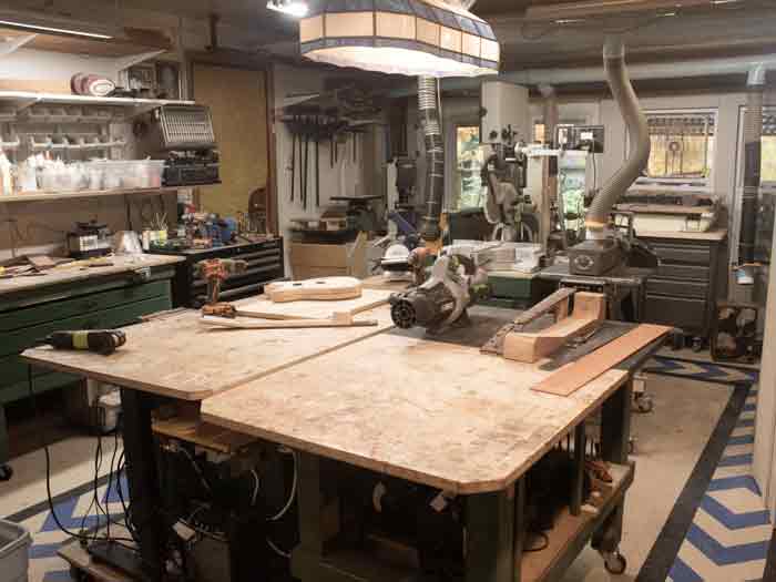 the guitar luthiers jay and max dickinson are acousitc guitar builders in there shop in portland oregon. both artists and craftsman of wood. follow along in the guitar shop blog